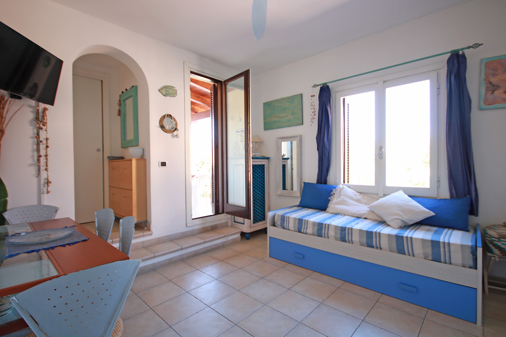 soggiorno-immobiliare oikos porto san paolo