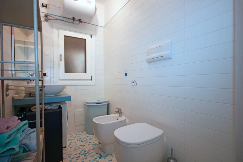 camereretta-immobiliare oikos porto san paolo